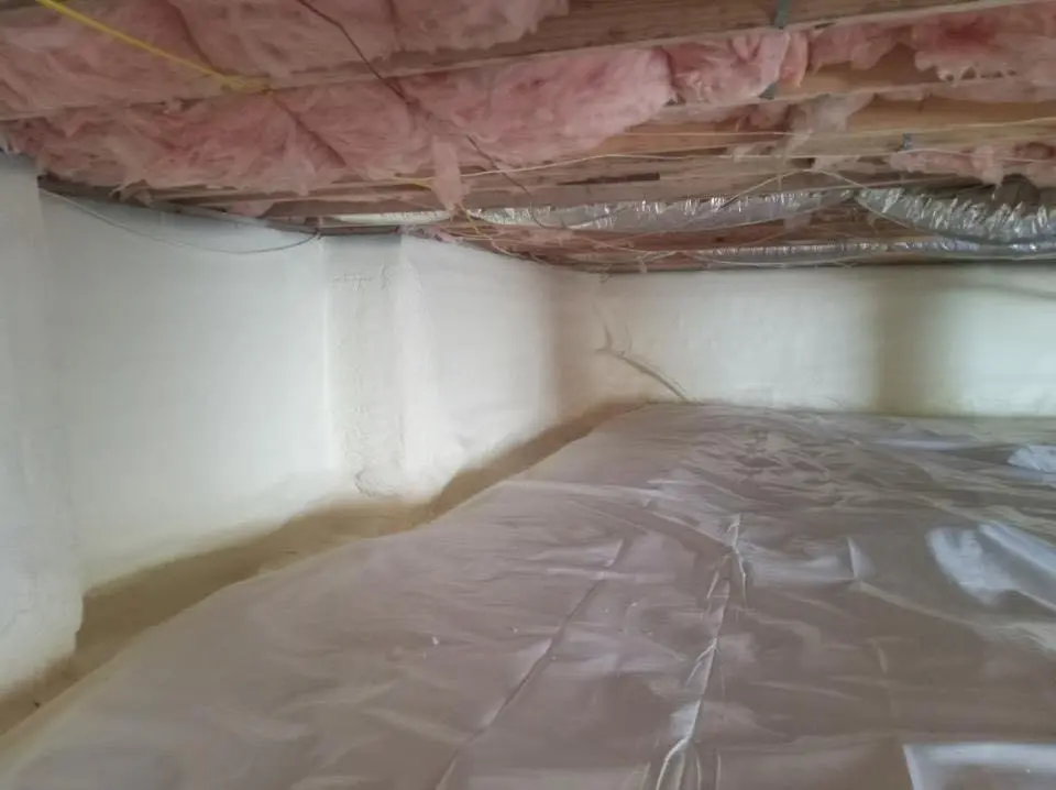Crawl space encapsulation with closed-cell spray foam for Commercial Roof Restoration in Andover